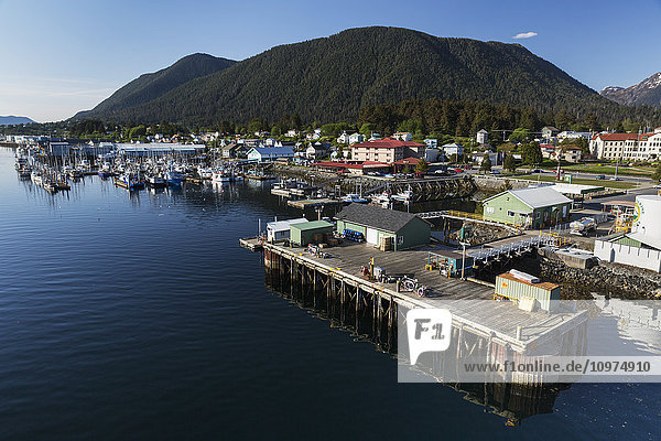 Aerial view of the pier at the Sitka Harbor with fishing Boats docked in the background  Sitka  Southeast Alaska  USA  Summer