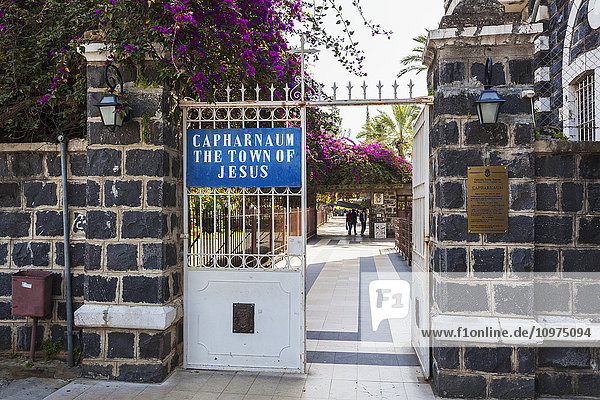 'Present day entrance to the historic village of Capernaum with a sign saying 'Capharnaum the town of Jesus'; Capernaum  Israel'