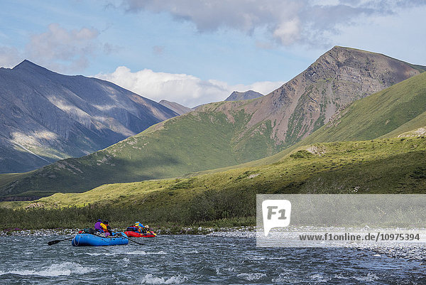 Rafters enjoy the day along the Marsh Fork of the Canning River in the Arctic National Wildlife Refuge  Summer  Alaska