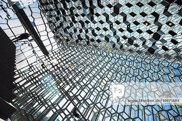 'The unique designs of the Harpa concert hall and conference centre is free and open for all to experience and view; Reykjavik Iceland'