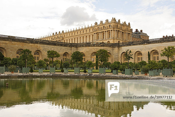 'Chateau de Versailles  reflects in the pond of l'Orangerie; Versailles  France'