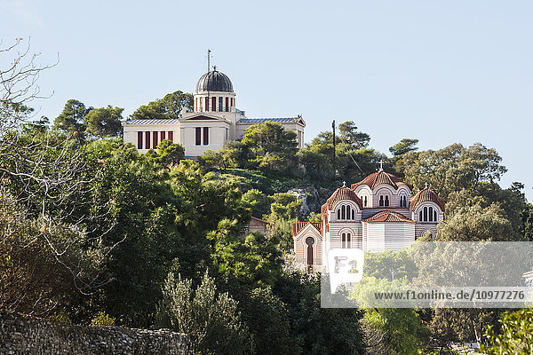 'Church buildings on a hill surrounded by trees; Athens  Greece'
