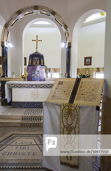'Interior of a church with altar and podium with sheet music on display; Galilee  Israel'
