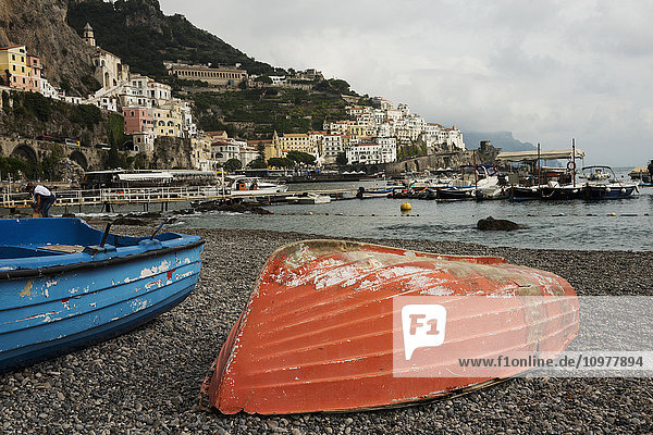 'Colourful wooden boats on the shore along the Amalfi coast; Amalfi  Campania  Italy'