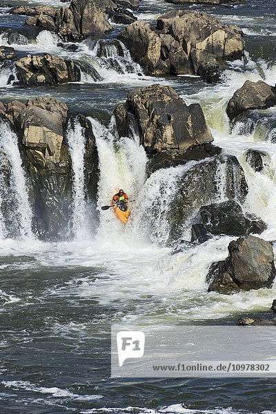 'Whitewater kayaking down waterfall in the Potomac River  Great Falls Park; Maryland  United States of America'