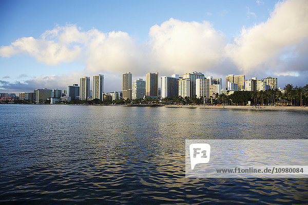 'Skyline of Honolulu across the water; Honolulu  Oahu  Hawaii  United States of America'