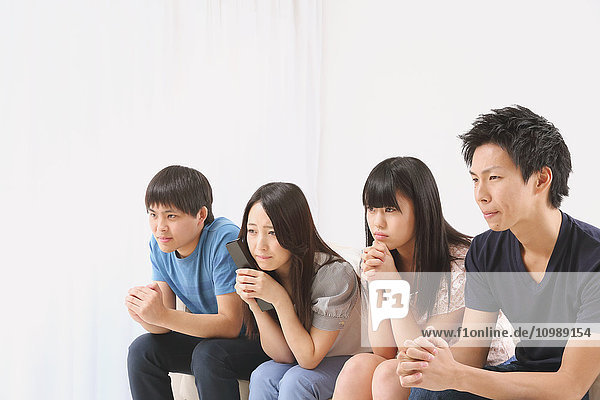 Group of Japanese supporters in the living room