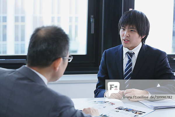 Japanese businesspeople in a modern office