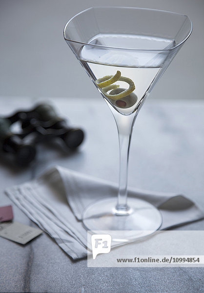 Close-up of Martini on Napkin with Opera Glasses and Tickets