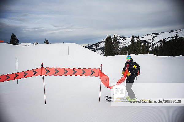 Reportage with a ski patrol team at the Avoriaz ski resort in Haute Savoie  France. The team are responsible for marking out the ski slopes  providing first aid to skiers  evacuations on the slopes as well as off piste and controlled avalanches.