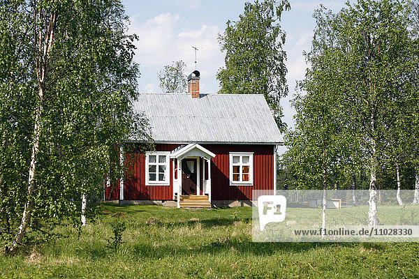 Red wooden house