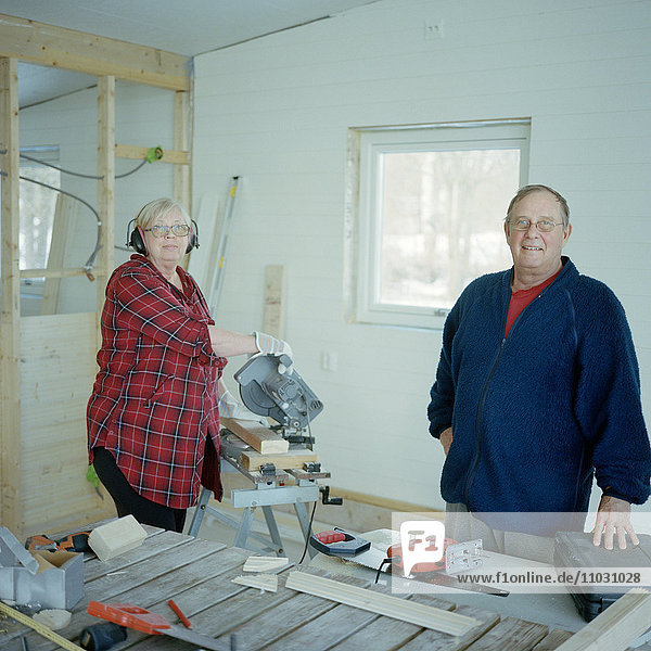 Senior couple doing carpentry