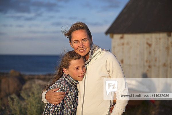 Mother and daughter hugging  Oland  Sweden