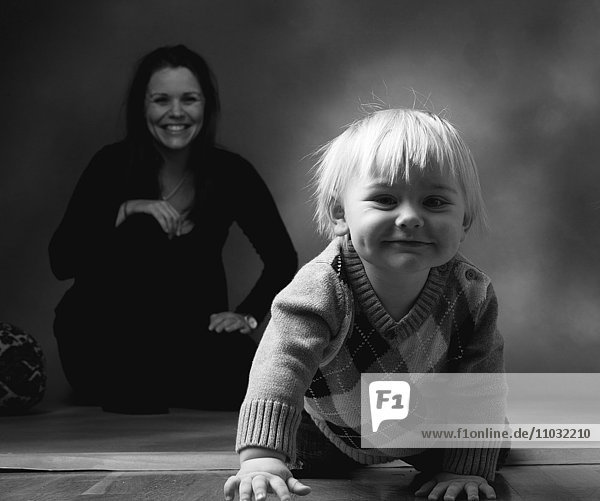 Studio portrait of toddler and mother