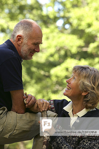 A smiling senior couple.