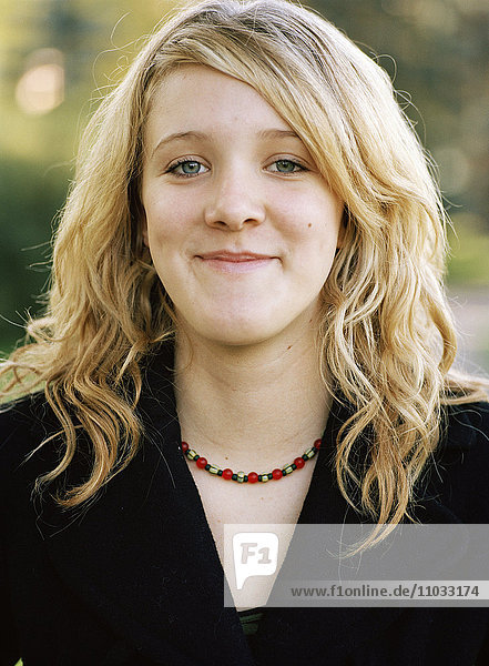 Portrait of a blond teenage girl.