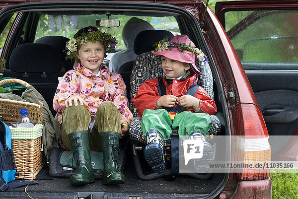 Children in the boot of a car  Sweden.