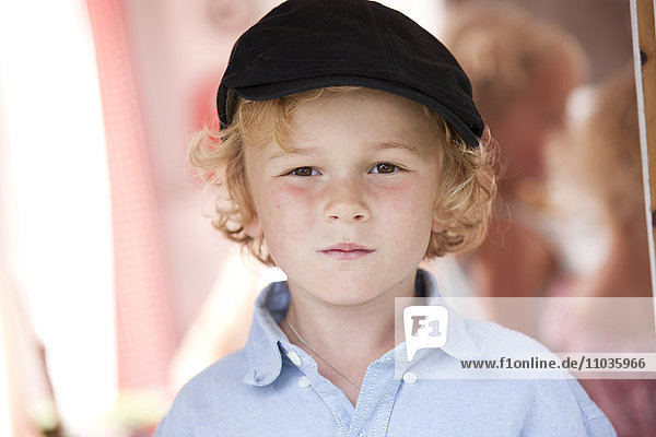 Portrait of boy wearing cap