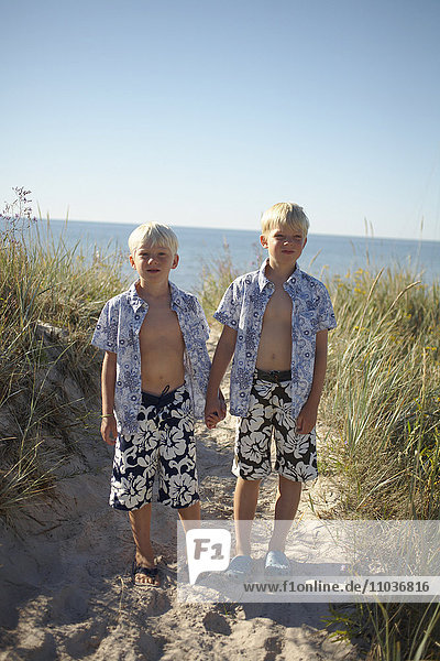 Brothers on a beach  Gotland  Sweden.
