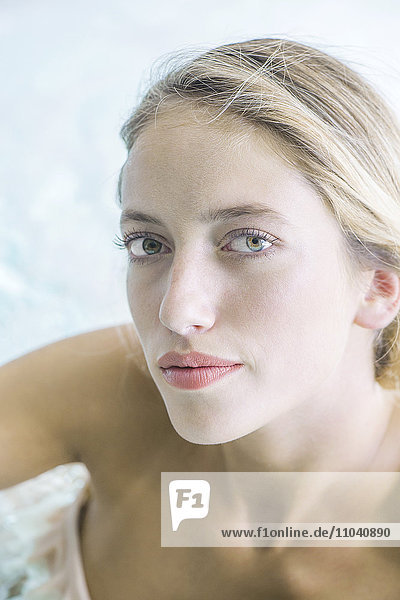 Woman soaking in spa  portrait