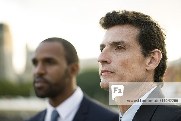 Businessman looking away in thought  portrait