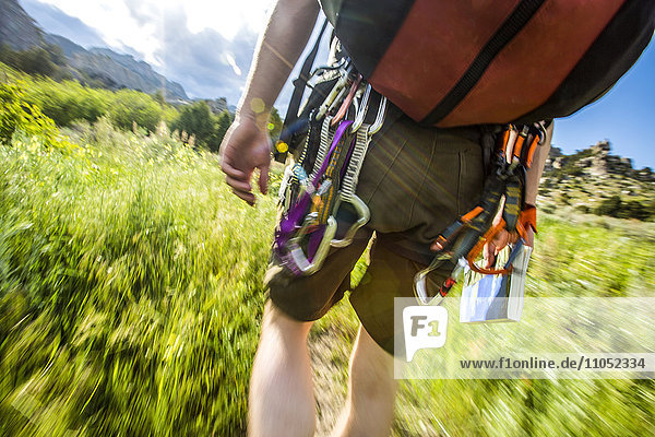 Carabiners on Caucasian hiker