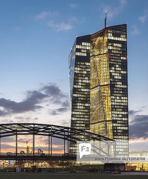 Brightly lit European Central Bank  ECB  at dusk  blue hour  Frankfurt  Hesse  Germany  Europe