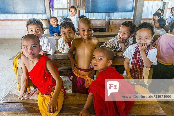 School children sitting at their desks  classroom  Shan State  Myanmar  Asia