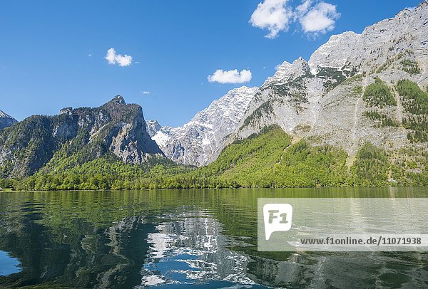Reflection in the water  Königssee lake with Watzmann massif  National Park Berchtesgaden  Berchtesgadener  Upper Bavaria  Bavaria  Germany  Europe