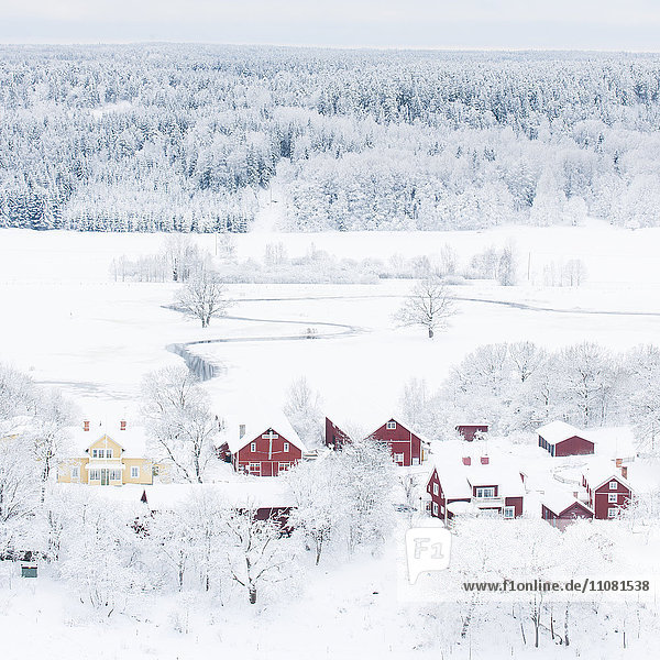 Winter landscape with distant village
