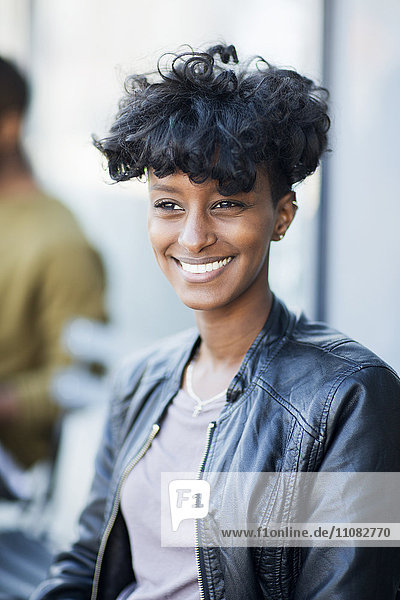 Portrait of smiling young woman  Stockholm  Sweden