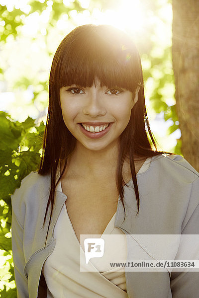 Smiling young woman looking at camera Stockholm Sweden