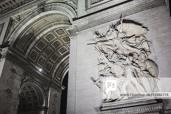 Low angle view of sculptures on Arc de Triomphe