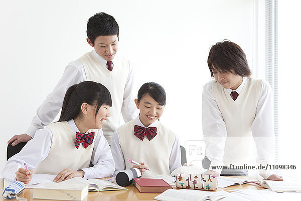 Four Students Studying