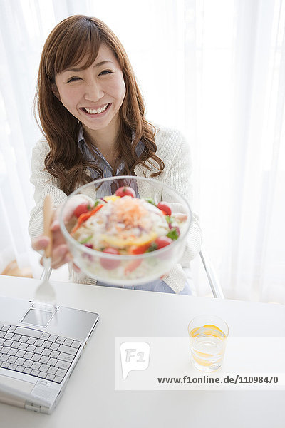 Woman Having Salad For Lunch
