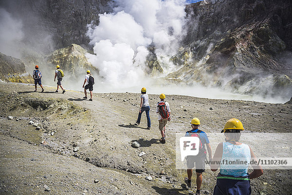 Tourists exploring White Island Volcano  an active volcano in the Bay of Plenty  North Island  New Zealand  Pacific
