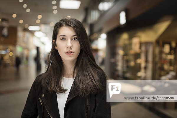 Portrait of woman in shopping center