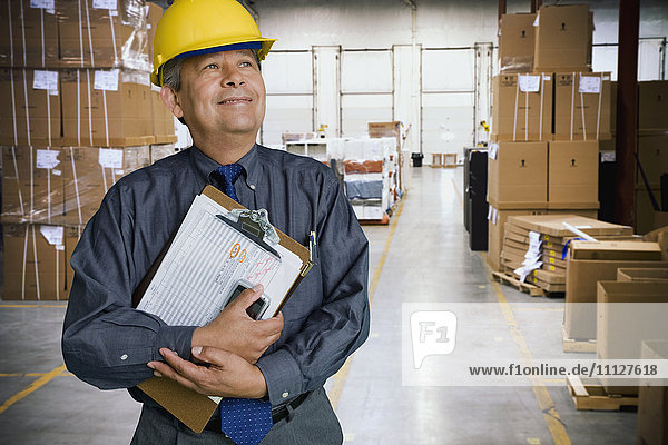 Hispanic man working in warehouse