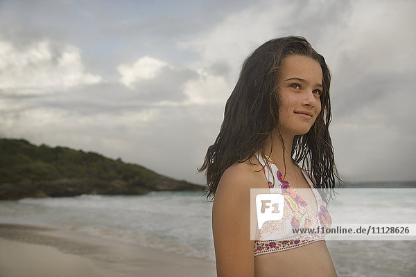 Young girl in bikini at beach