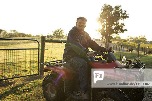 Caucasian man riding leisure vehicle