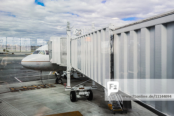 Walkway to airplane on runway