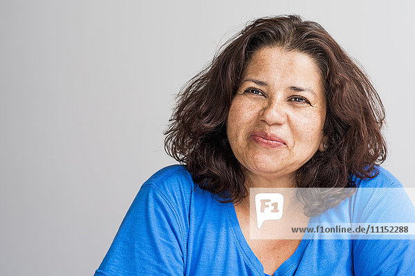 Close up of Hispanic woman smiling
