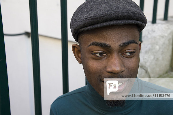 Close up of face of curious Black man