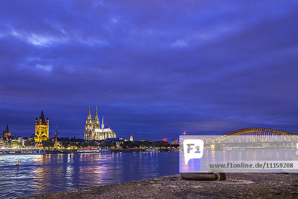 Germany  Cologne  view to the city and Hohenzollern bridge with Rhine River in the foreground