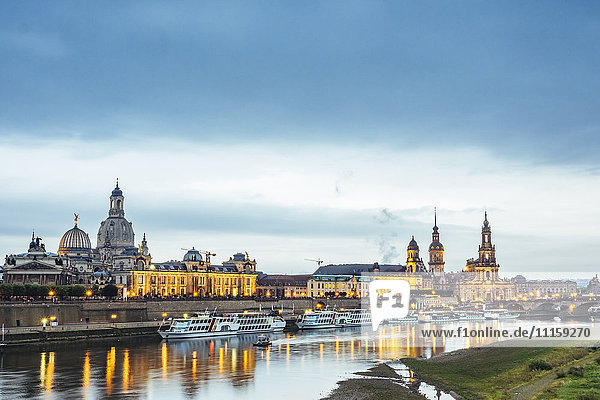 Germany  Saxony  Dresden  historic old town with Elbe River in the foreground in the evening
