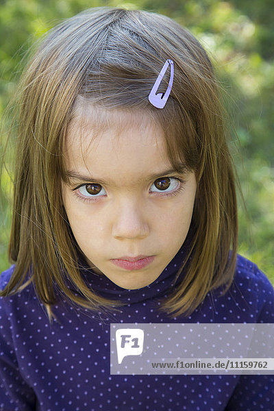 Little girl looking serious  portrait