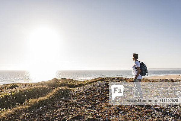 France  Bretagne  Finistere  Crozon peninsula  woman during beach hiking