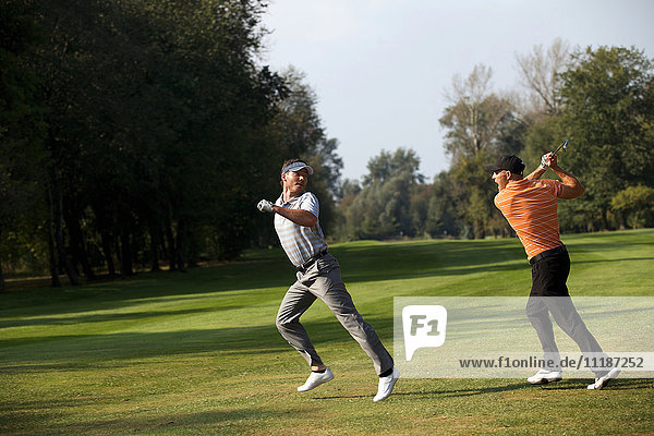 Friends having fun in golf course