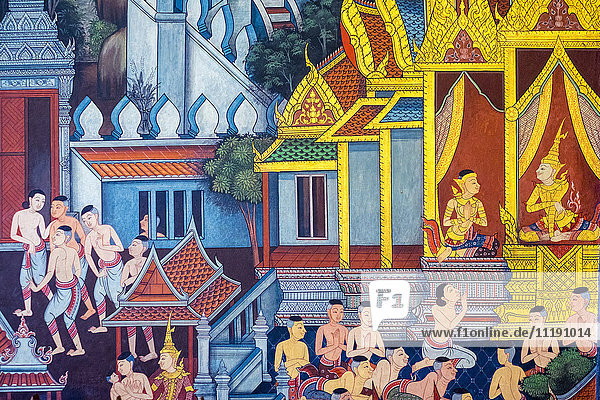 Colorful painted murals depicting scenes from life of Buddha inside Wat Pho (Temple of the Reclining Buddha) Bangkok Thailand