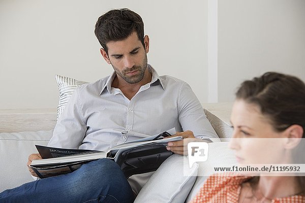 Man reading a magazine